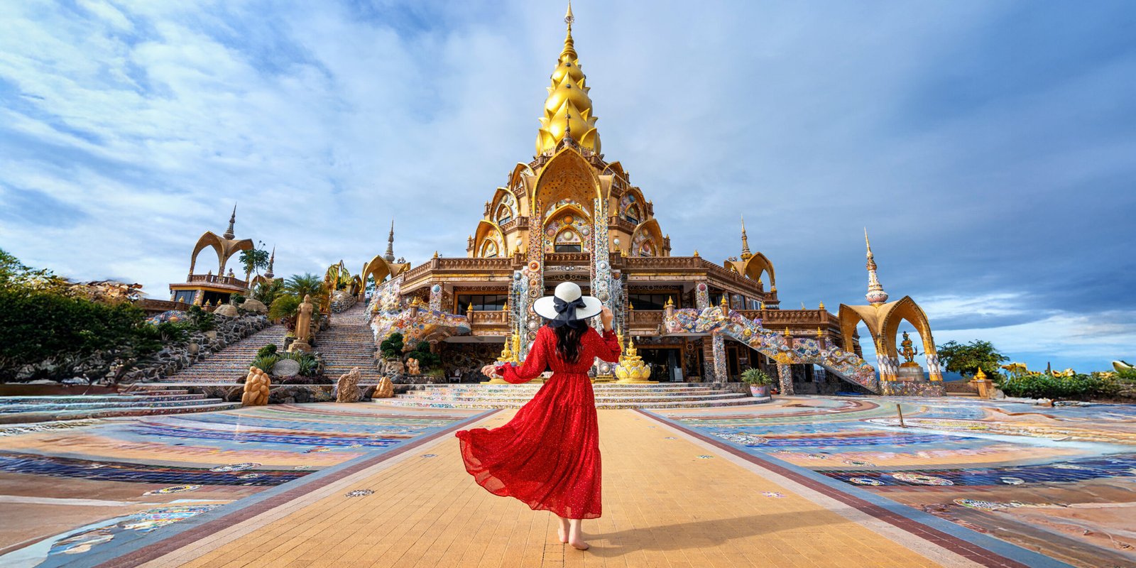 Golden beach in Thailand with tourists relaxing